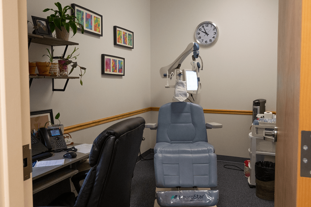 transcranial magnetic stimulation therapy chair in the offices at the wheeling wv harmony location