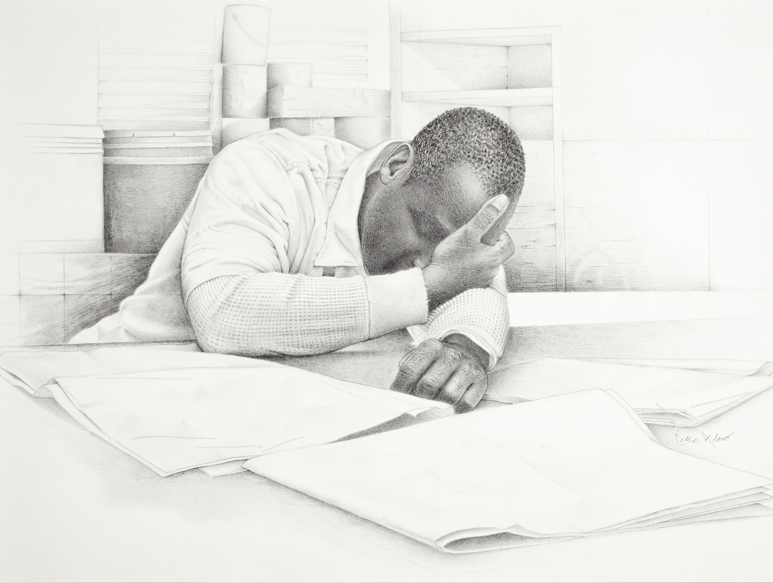 Man laying down on his desk because of the lack of sleep or exhaustion of life.