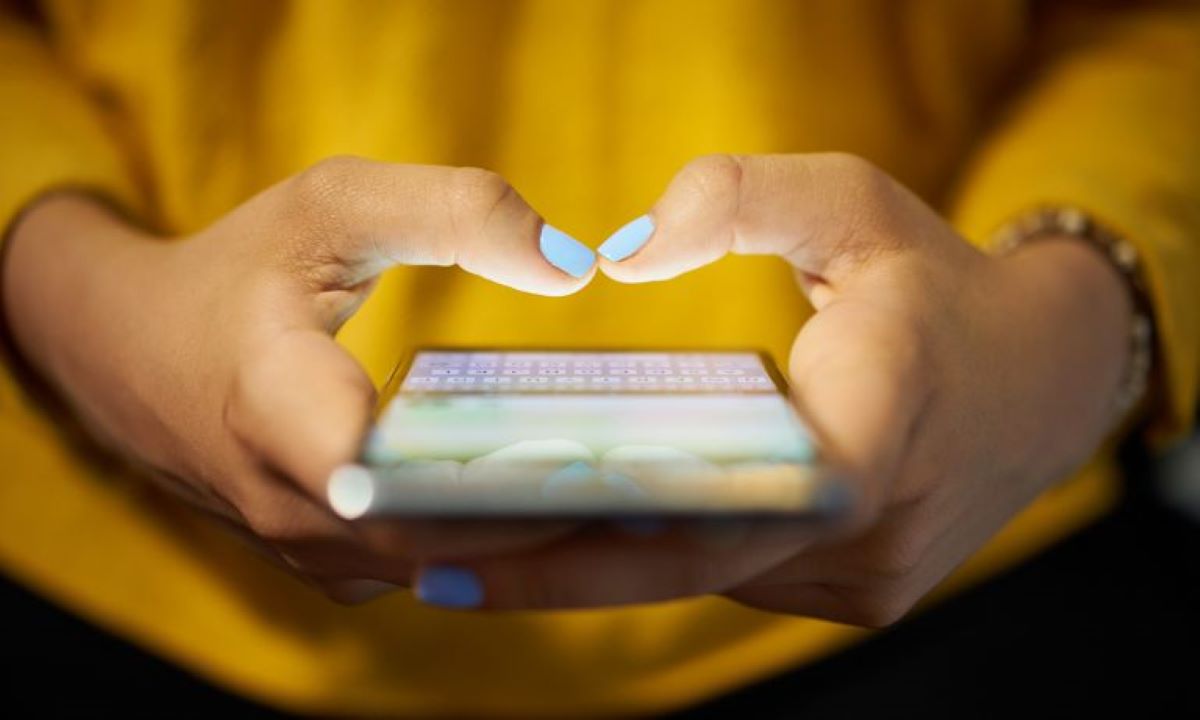 Phone Cradled in Woman's Hands