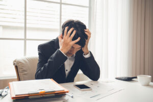 Distressed man thinking about anxiety and ADHD