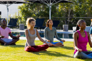 A group of people using yoga for stress relief