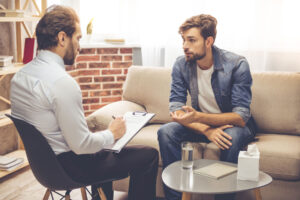Two people in cognitive-behavioral therapy