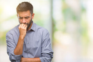 A man thinking about his OCD triggers