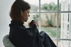 A woman thinking about trauma and the brain