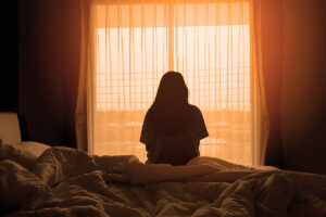 A woman thinking about trauma and the brain