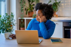 A woman reading about women's mental health